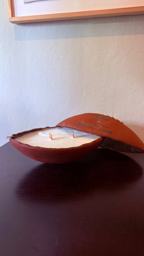 Vintage football candle open showing soy wax interior